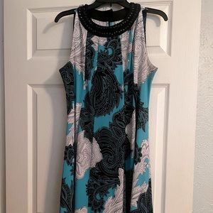 Super cute sleeveless dress!  Size 10.